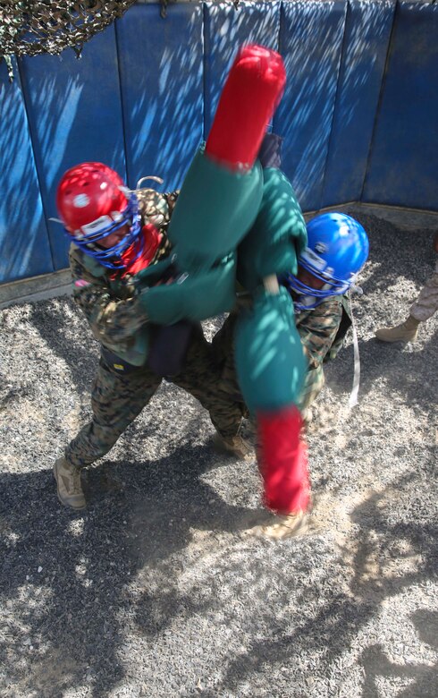 Recruits with Bravo Company, 1st Recruit Training Battalion, compete against each other during Pugil Sticks III at Marine Corps Recruit Depot San Diego, May 24. Recruits were encouraged to use any technique necessary to overcome their opponent during their single match. Annually, more than 17,000 males recruited from the Western Recruiting Region are trained at MCRD San Diego. Bravo Company is scheduled to graduate June 17.