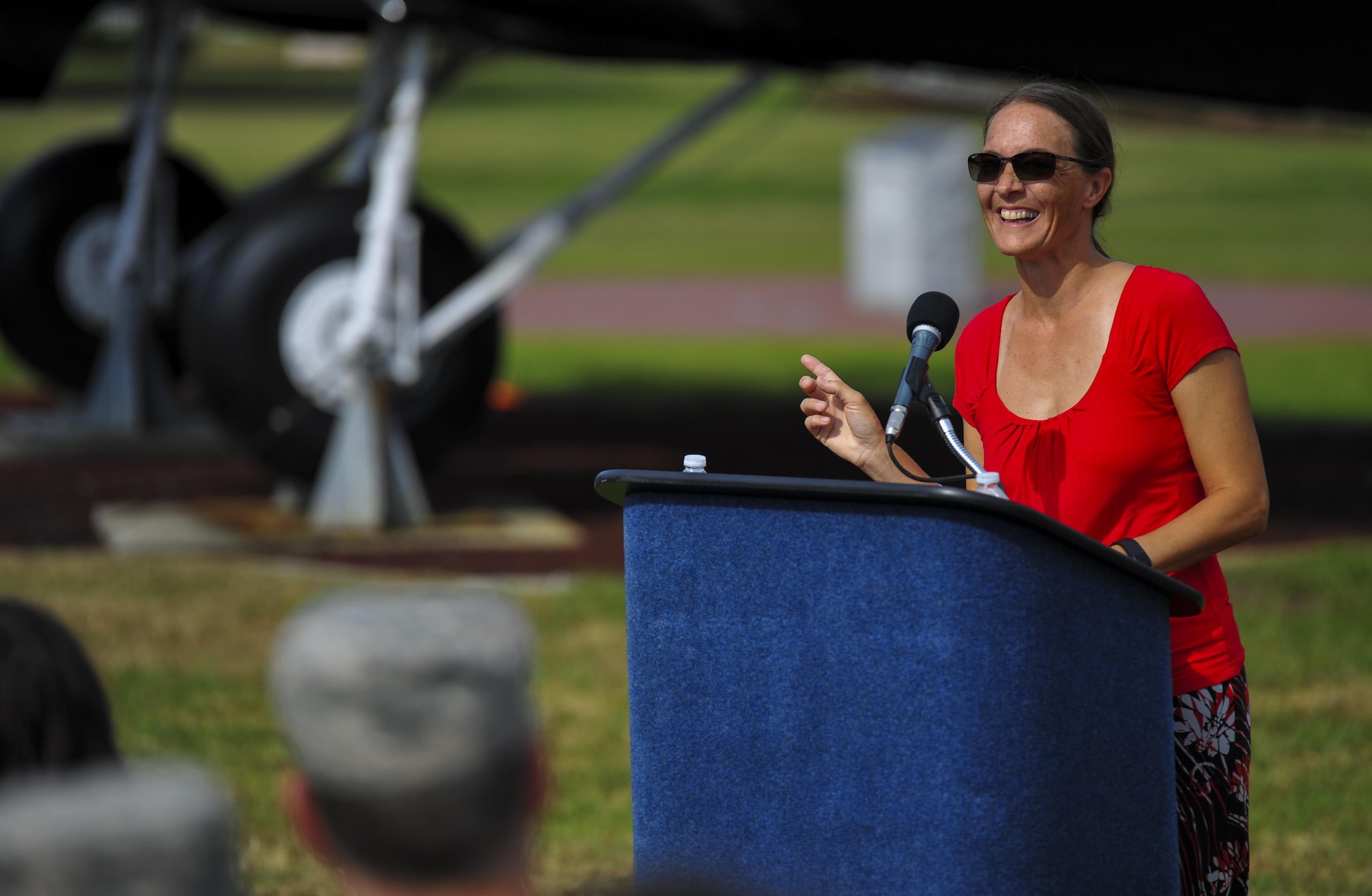 Rachel Henry, the resource administrator with Air Force Special Operations Command, speaks during the Gold Star Mothers plaque dedication ceremony at Hurlburt Field, Fla., May 25, 2016. The plaque was presented to Lt. Gen. Brad Heithold, commander of AFSOC, by George Turak, a Vietnam veteran, during a ceremony held Sept. 18, 2015, to honor the family members of AFSOC’s fallen service members. (U.S. Air Force photo by Airman 1st Class Joseph Pick) 
