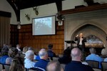 Mr. James Parlier, retired U.S. Navy command master chief, speaks to one of his slides during his keynote speech at the annual Spiritual and Emotional Care in Disasters Summit May 24, 2016, at the Glen Eyrie Castle in Colorado Springs, CO.

Parlier was the command master chief assigned to the guided-missile destroyer U.S.S Cole (DDG-67) on Oct. 12, 2000, when it was subjected to a terrorist attack while in port in Yemen. His emotional
presentation focused on the terrorist attack that killed 17 Sailors, the response during and after, and lessons learned.  The annual summit is hosted
by the North American Aerospace Defense Command and U.S. Northern Command Chaplain Office.
