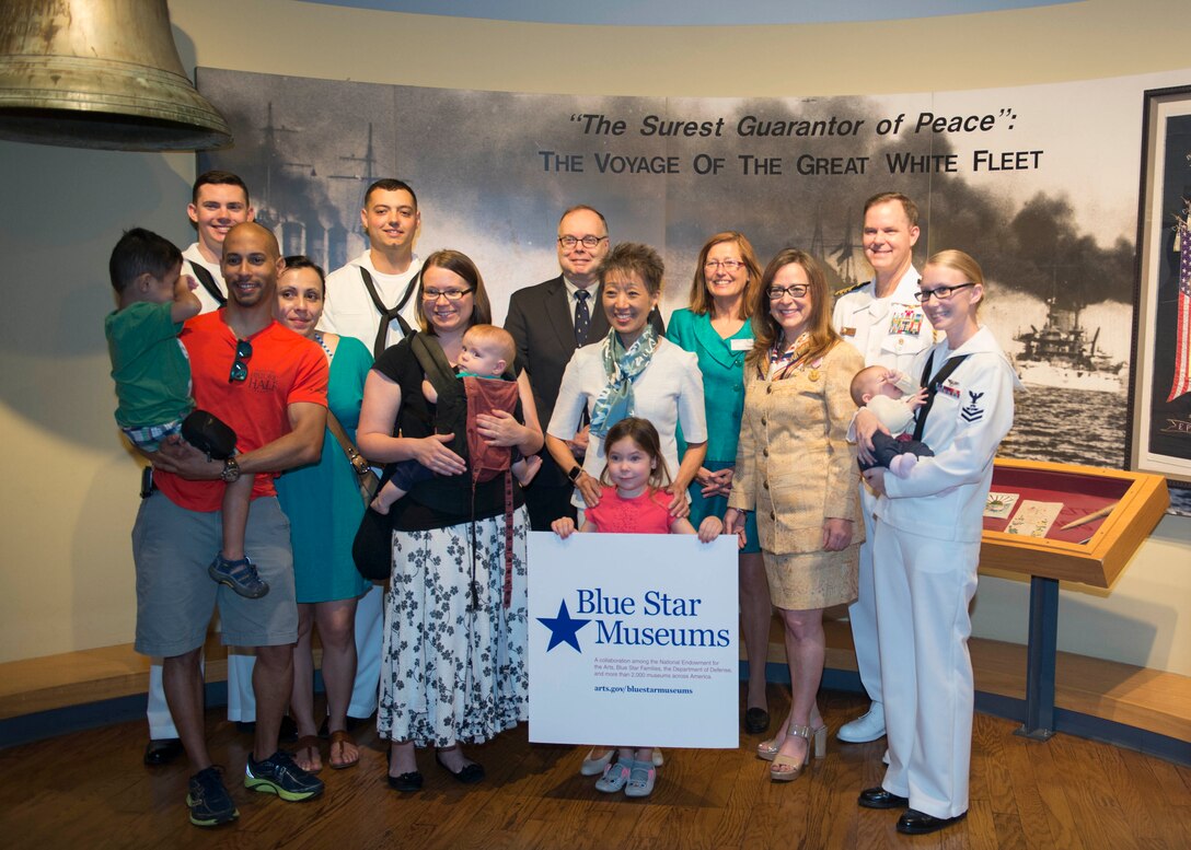 Participants pose following a news conference launching Blue Star Museums at the Hampton Roads Naval Museum, in Norfolk, Va., May 26, 2016. Blue Star Museums is a collaboration among the National Endowment for the Arts, Blue Star Families, the Department of Defense, and more than 2,000 museums across America to offer free admission to the nation's active duty military members and their families from Memorial Day through Labor Day. Navy photo by Petty Officer 3rd Class Amy M. Ressler