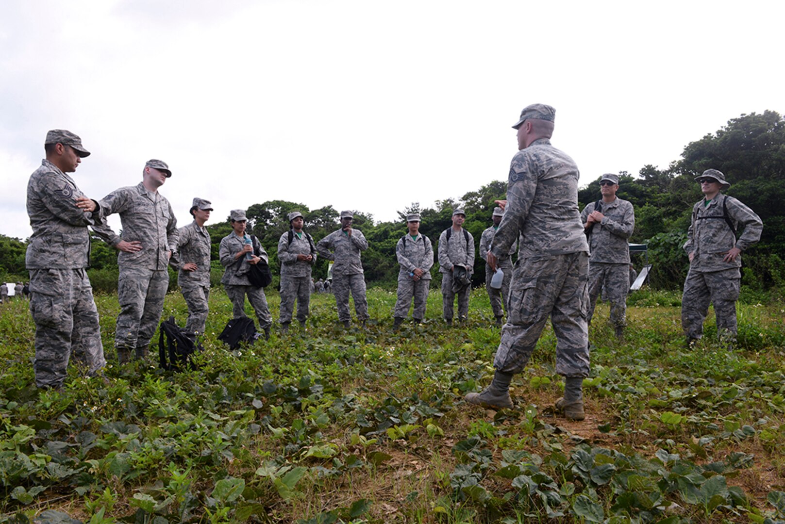 Airmen from the 18th Medical Group receive an eye-care briefing during a field training day May 20, 2016, at Area One, Kadena Air Base Japan. Airmen broke down into smaller ‘deployed’ groups called chalk teams and cycled through seven different training stations that tested their medical knowledge and life-sustaining skillsets. 