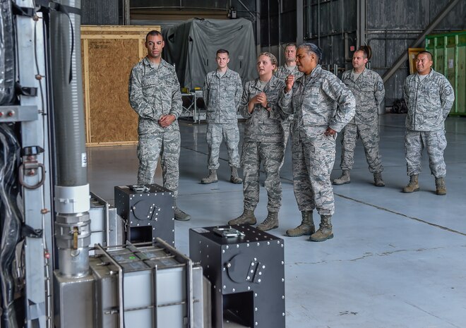 Airman 1st Class Shawn Mitchell, a 628th Medical Group dental assistant, gives Command Chief Master Sgt. Shelina Frey, Air Mobility Command chief, a tour of the X-Ray room in the dental clinic during her visit to Joint Base Charleston May 22 - 27, 2016. The 628th Medical Group’s highly trained staff is dedicated to providing superior health dental care, anytime, anywhere. (U.S Air Force Photo/Airman Megan Munoz)