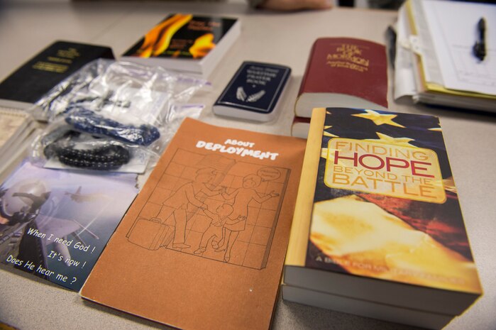 Books on spiritual fitness are displayed on the deployment line as part of Exercise Crescent Reach 16, May 24, 2016, at Joint Base Charleston, S.C. The exercise tested JB Charleston’s ability to launch a large aircraft formation and mobilize a large amount of cargo and passengers. (U.S. Air Force photo/Staff Sgt. Jared Trimarchi)