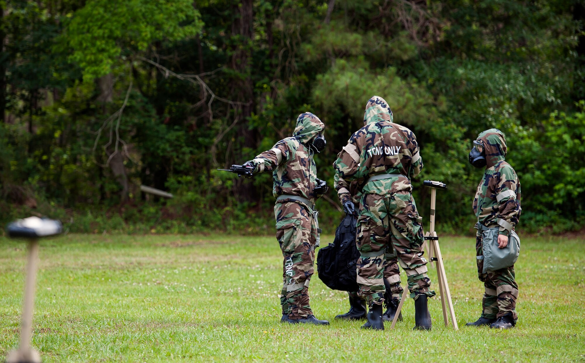 Airmen inspect damage caused by a simulated attack during a chemical, biological, radiological, nuclear and explosives drill as part of Exercise Crescent Reach 16, May 19, 2016, at Joint Base Charleston, S.C. The exercise tested JB Charleston’s ability to launch a large aircraft formation and mobilize a large amount of cargo and passengers. (U.S. Air Force photo/Staff Sgt. Jared Trimarchi)