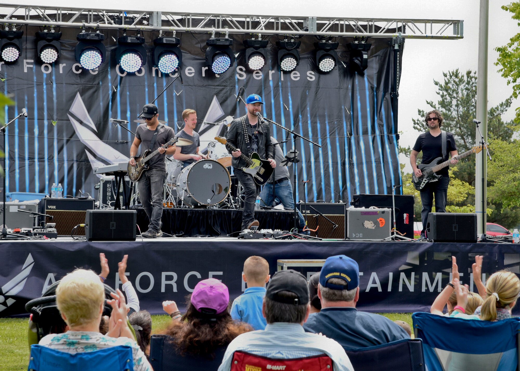 David Cook, American Idol winner, performs a free concert May 26, 2016 at Fairchild Air Force Base, Wash. Cook has performed for U.S. troops at military installations around the world including Iran, Iraq, Kuwait, Bahrain, the Persian Gulf and across Europe. (U.S. Air Force photo/Airman 1st Class Taylor Bourgeous)