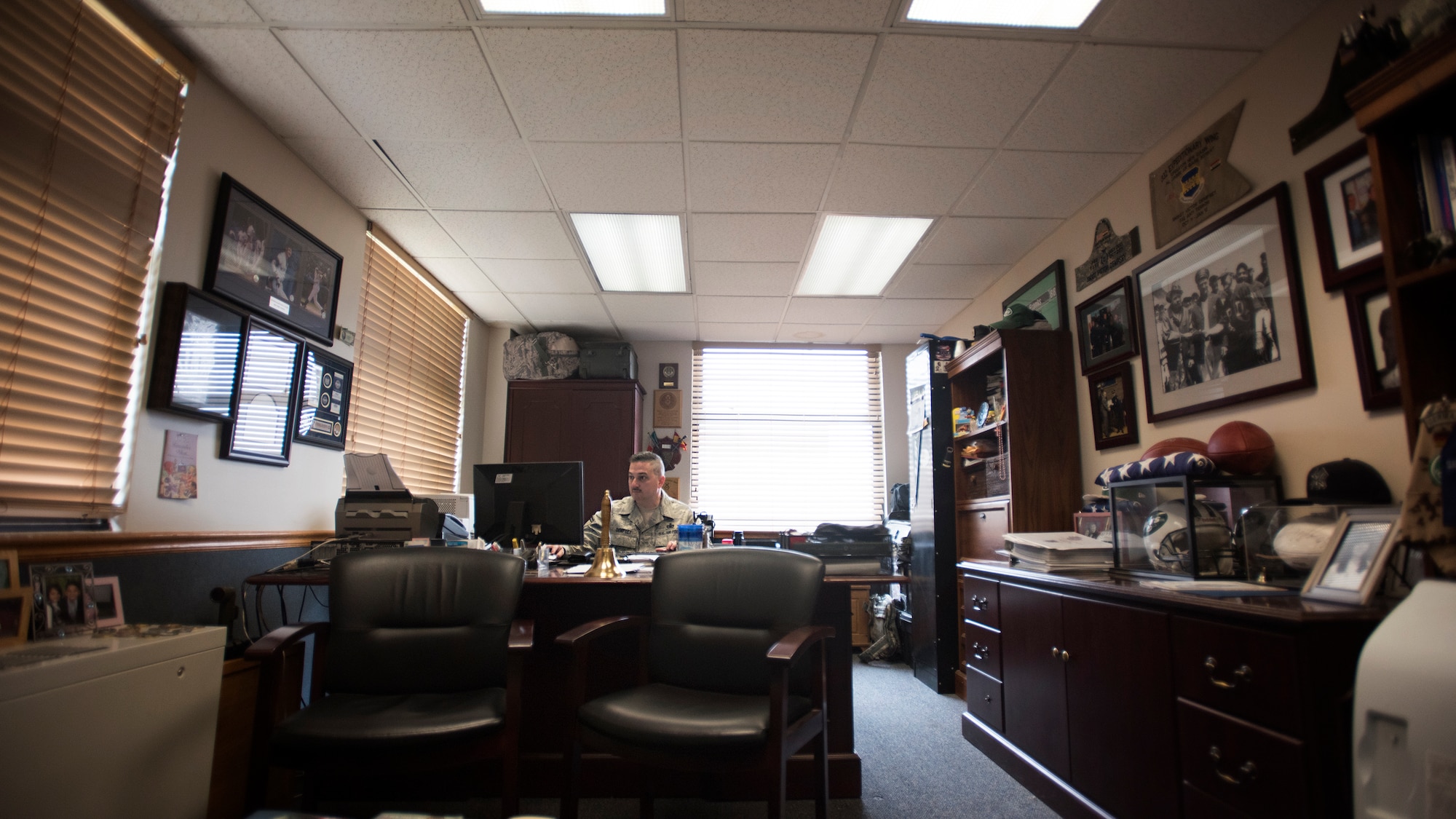 Senior Master Sgt. Victor Dempsey, 514th Security Forces Squadron superintendent, sits in his office May 18, 2016 at Joint Base McGuire-Dix-Lakehurst, N.J. Dempsey has been an Air Force Reserve security forces member for thirty years and served simultaneously as an New York City police officer for twenty years. (U.S. Air Force photo by Staff Sgt. Katherine Tereyama)