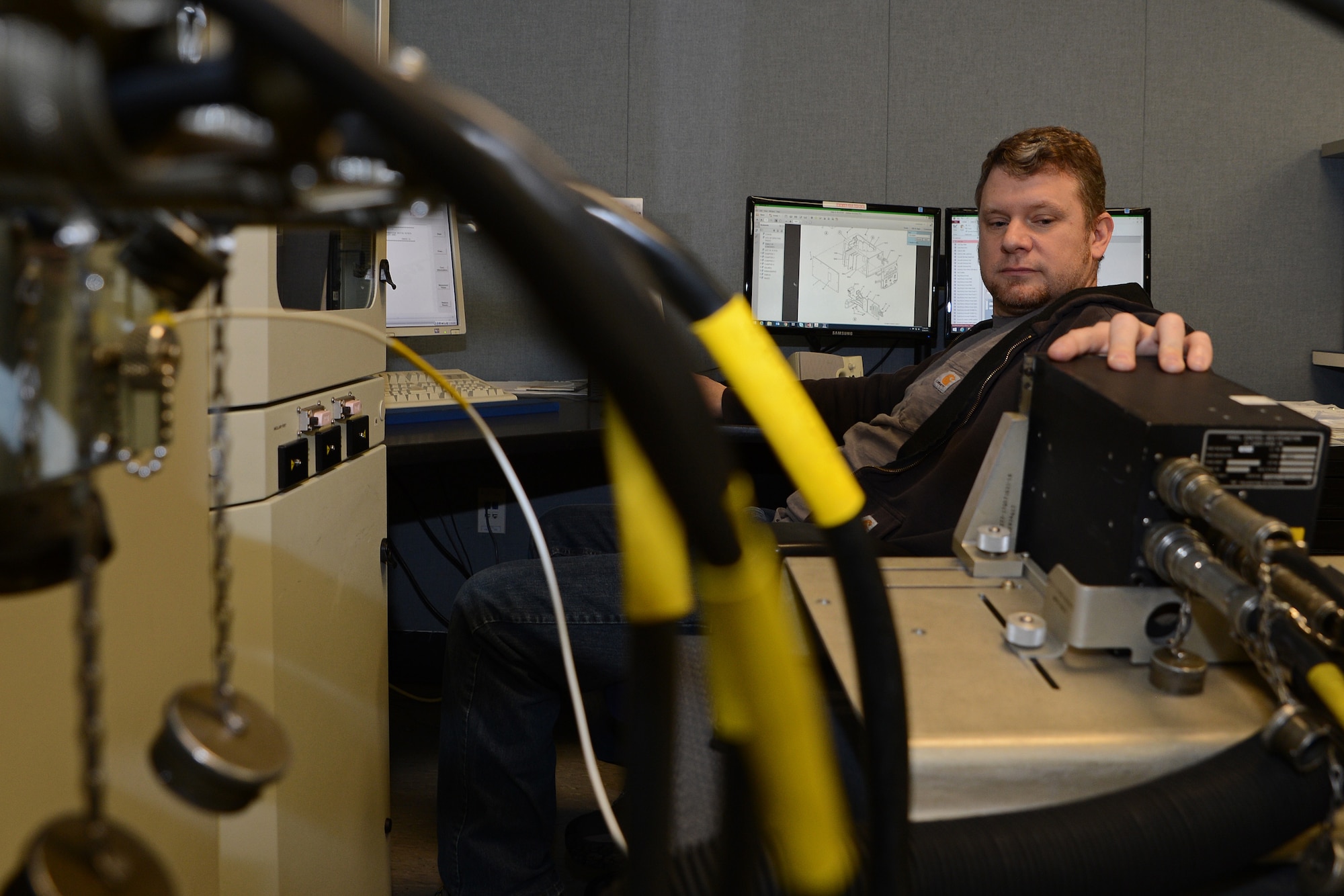 Scott Snyder, 62nd Maintenance Squadron avionics technician, tests a C-17 multi-function control panel May 24, 2016, at Joint Base Lewis-McChord, Wash. The C-17 multi-function control panels are one of the many C-17 avionics parts regularly worked on by the avionics flight to keep aircraft airworthy. (U.S. Air Force photo/ Senior Airman Jacob Jimenez)  