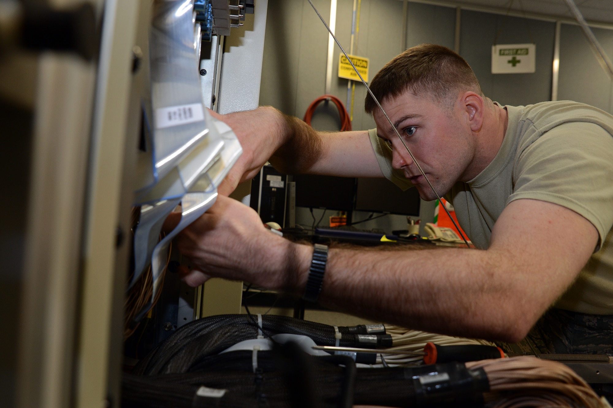 Staff Sgt. Curtis Rosga, 62nd Maintenance Squadron avionics technician, troubleshoots C-17 automated test equipment May 24, 2016, at Joint Base Lewis-McChord, Wash. Airmen from the avionics flight have successfully worked with Boeing to provide better aircraft parts for the C-17 to keep them flying longer. (U.S. Air Force photo/ Senior Airman Jacob Jimenez) 