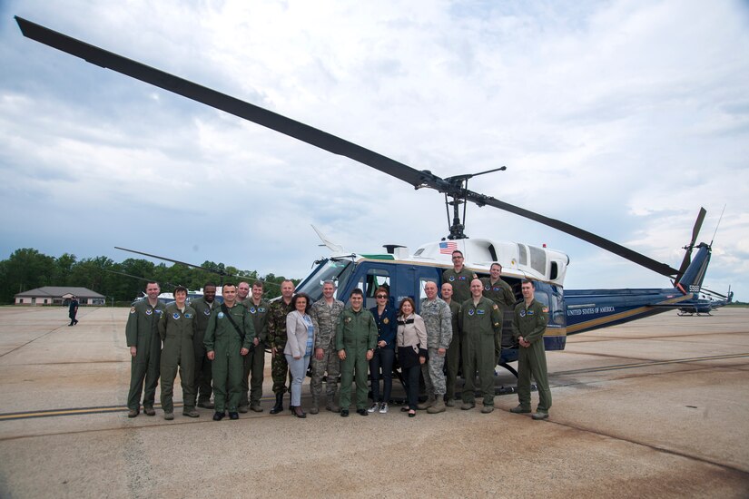 Maj. Gen. Laurian Anastasof, Romanian Air Force chief of air staff, and attachés, along with Maj. Gen. Eric Vollmecke, U.S. Air Forces in Europe and Air Forces Africa mobilization assistant to the commander, pose for a photo with the 1st Helicopter Squadron at Joint Base Andrews, Md., May 23, 2016. Anastasof visited the base as part of the U.S. Air Force’s Counterpart Visit Program. (U.S. Air Force photo by Airman Gabrielle Spalding)