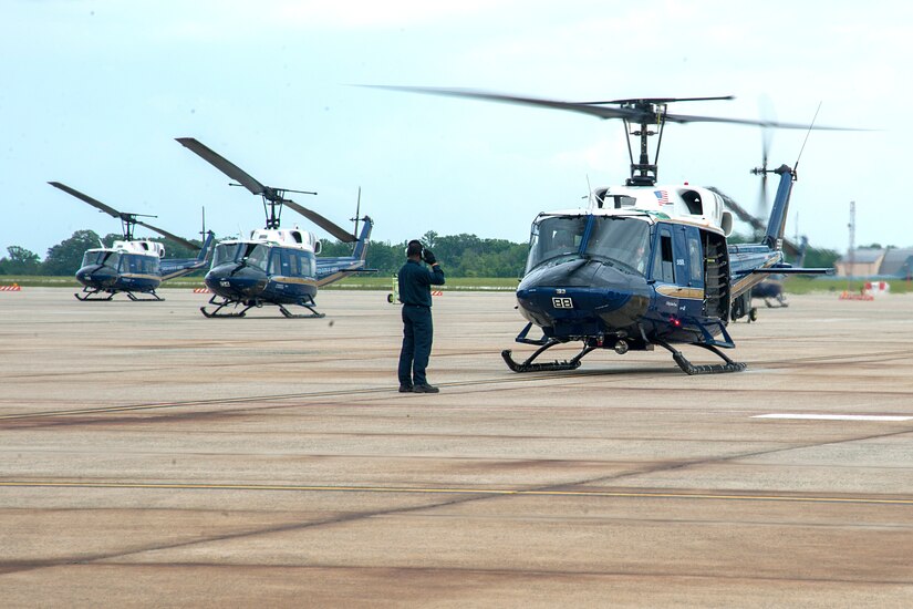The 1st Helicopter Squadron aircrew prepare for post flight landing procedures at Joint Base Andrews, Md., following a flight over the National Capitol Region, May 23, 2016. The tour was part of Romania’s chief of air staff visit to show the 1st HS operations. (U.S. Air Force photo by Airman Gabrielle Spalding)