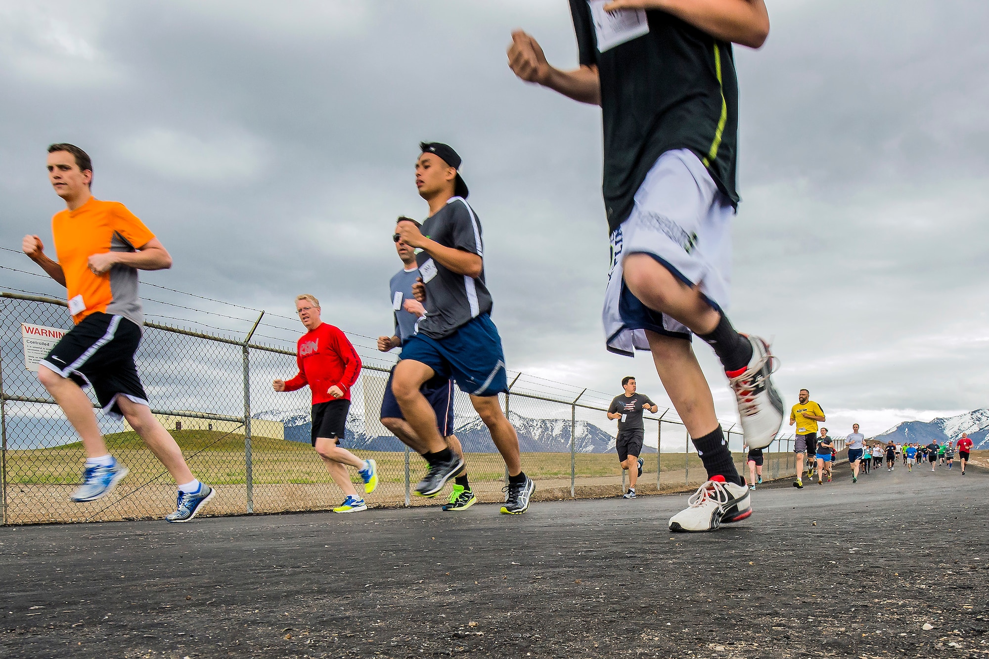 Runners compete April 13 during the Hill Air Force Base Spring Race Series. The season’s second race, depicted here, was run on the ‘MUNS’ course. The series’ goal is to promote camaraderie and participation. (U.S. Air Force photo by Paul Holcomb)