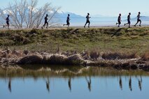 Runners compete April 4 during the Hill Air Force Base Spring Race Series. The Duck Pond race, shown here, was the season’s first. More than 200 runners, joggers, and walkers started the race. (U.S. Air Force photo by Paul Holcomb)