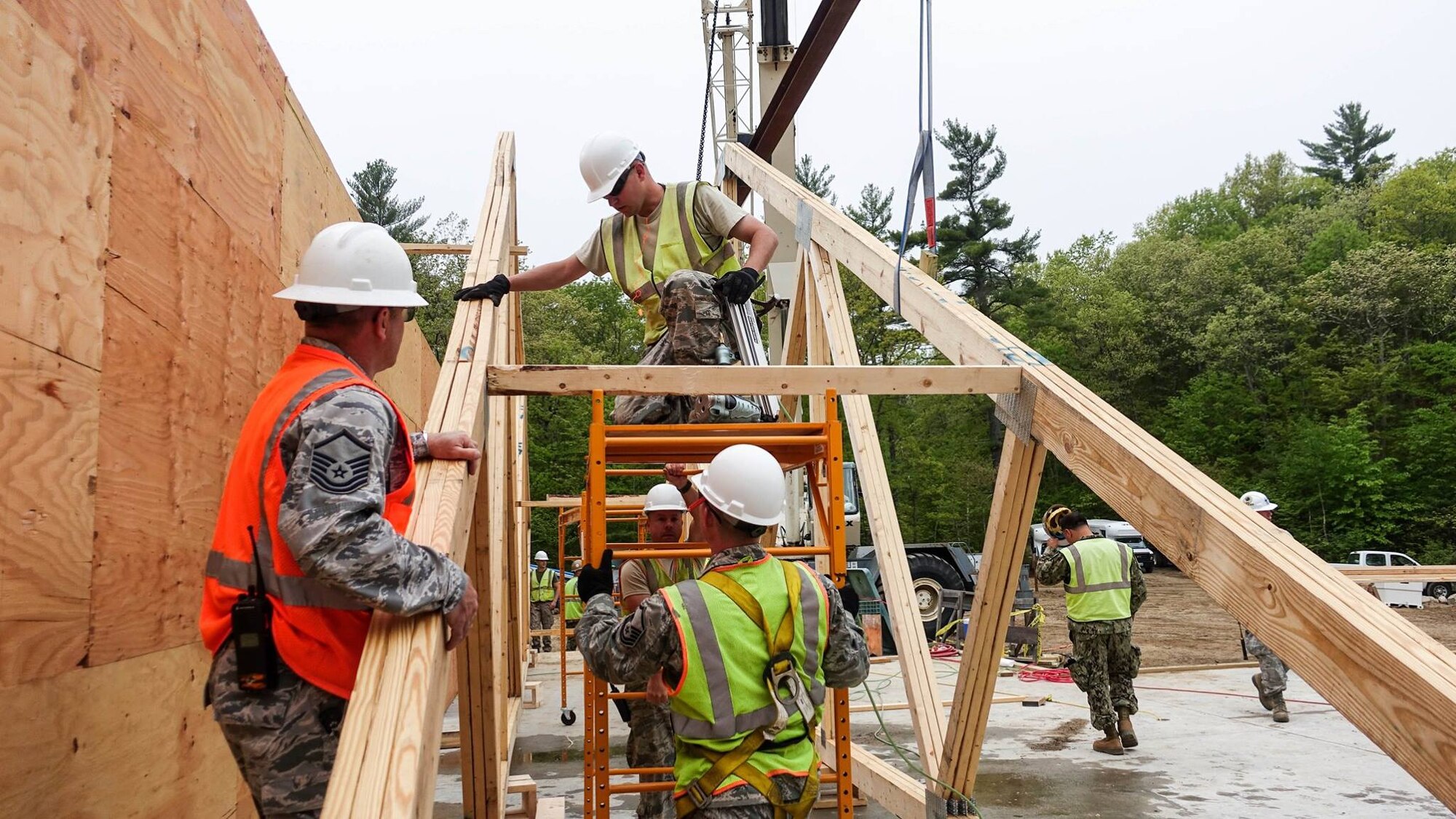 U.S. Airmen with the 139th Civil Engineer Squadron, Missouri Air National Guard, participate in Innovative Readiness Training (IRT), at William Hinds Boy Scout Camp in Raymond, Maine, on May 24, 2016. The IRT is part of a joint exercise with the U.S. Marines, Navy, Air National Guard, and Air Force Reserve to help rebuild parts of the camp. (U.S. Air National Guard photo by Senior Airman Sheldon Thompson/released)