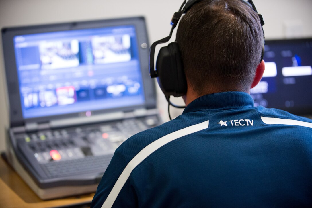 Mr. David Barlow, graphics manager assigned to the I.G. Brown Training and Education Center, directs a broadcast May 10, 2016, at the Air National Guard Readiness Center on Joint Base Andrews, Md., during the assumption of command ceremony for the Director of the Air National Guard. (U.S. Air National Guard photo by Tech. Sgt. Jonathan Young/Released)