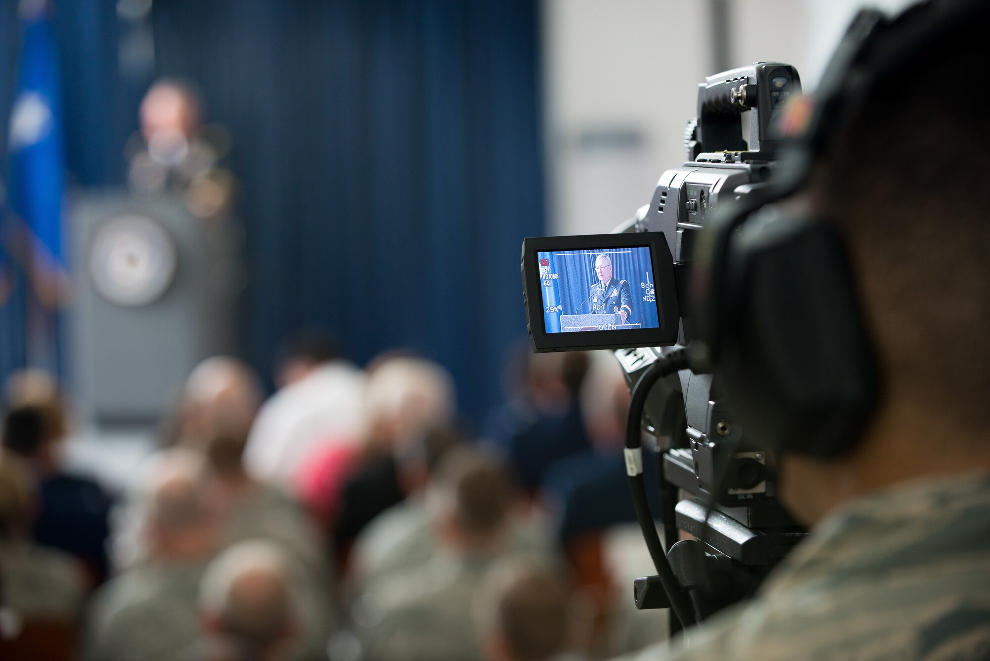 Tech. Sgt. Erik Gallion, a broadcaster assigned to the I.G. Brown Training and Education Center, operates a camera May 10, 2016, at the Air National Guard Readiness Center on Joint Base Andrews, Md., while Chief of the National Guard Bureau Army Gen. Frank J. Grass speaks during the assumption of command ceremony for the Director of the Air National Guard. (U.S. Air National Guard photo by Tech. Sgt. Jonathan Young/Released)
