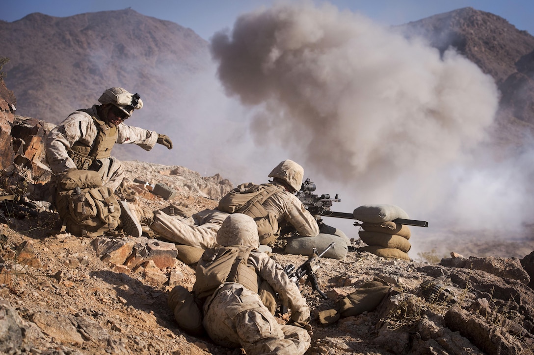 Marines and sailors conduct a training attack on range 400 at Marine Corps Air Ground Combat Center Twentynine Palms, Calif., May 25, 2016. Marines use the complex range to test and improve combat readiness and skills. Navy photo by Petty Officer 1st Class Nathan Laird