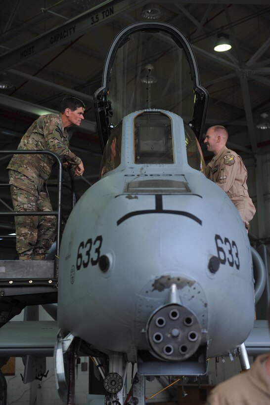 U.S. Army Gen. Joseph L. Votel, Commander, United States Central Command speaks with an A-10 Thunderbolt II pilot at Incirlik Air Base, Turkey during a visit on May 23, 2016.  Votel was given an opportunity to see firsthand some of the aircraft available to support Operation Inherent Resolve missions and to meet the individuals who enable those capabilities. (U.S. Air Force Photo by Tech. Sgt. Joshua T. Jasper/Released)