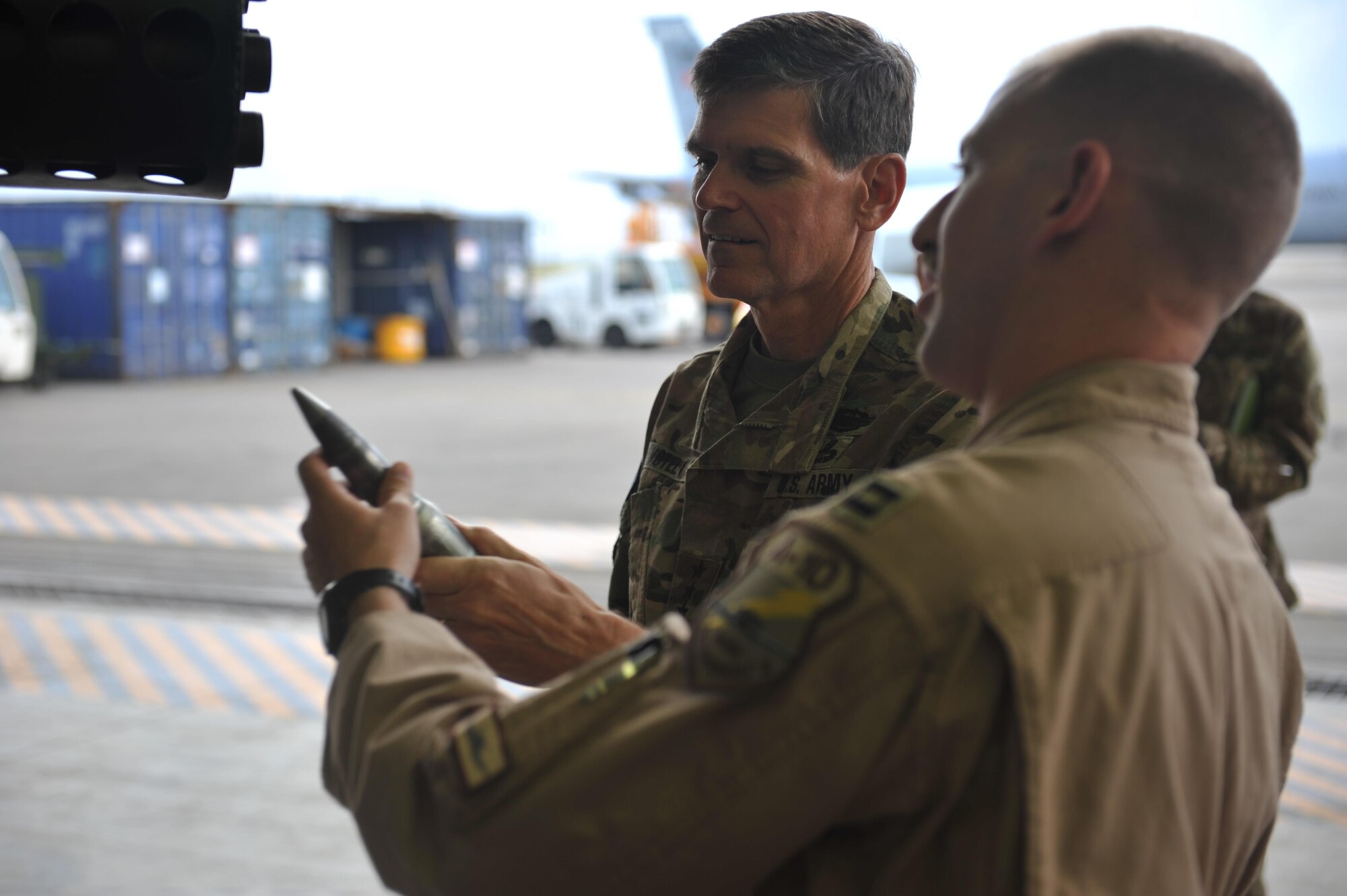 A member of the 447th Air Expeditionary Group shows U.S. Army Gen. Joseph L. Votel, Commander, United States Central Command a GAU-8 30mm cannon projectile from an A-10 Thunderbolt II during a visit to Incirlik Air Base, Turkey on May 23, 2016. During Votels visit he was given an opportunity to learn more about the unique capabilities each service provides to Operation Inherent Resolve missions. (U.S. Air Force Photo by Tech. Sgt. Joshua T. Jasper/Released)