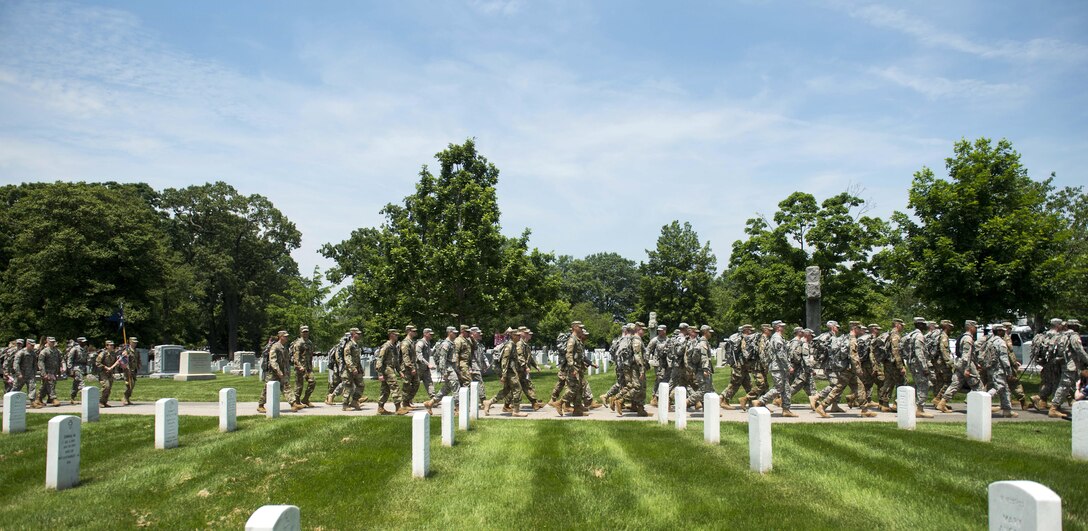Soldiers march into Arlington National Cemetery from Joint Base Myer-Henderson Hall to participate in "Flags In" at Arlington National Cemetery in Arlington, Va., May 26, 2016. Army photo by Rachel Larue