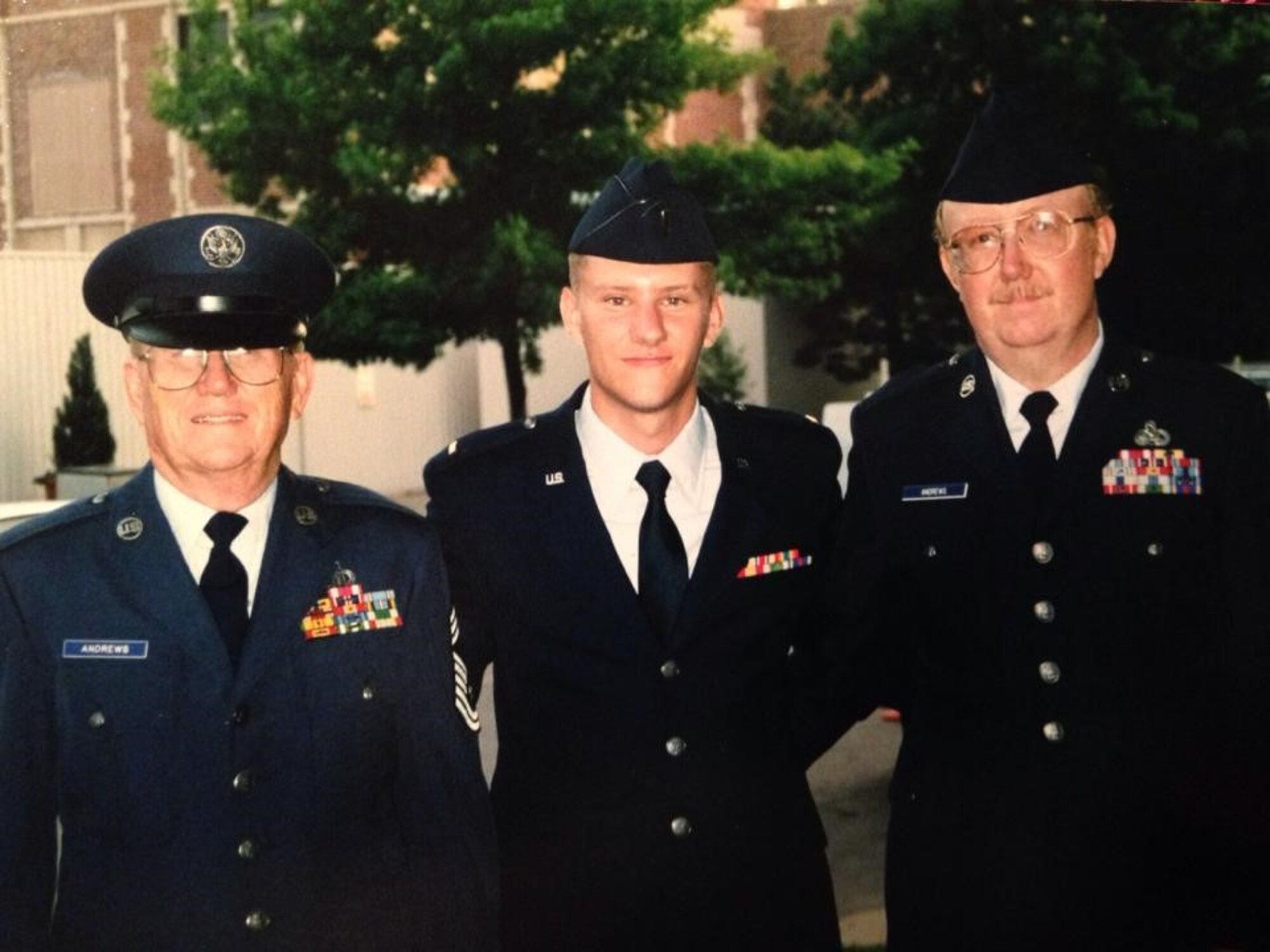 Chief Master Sgt. (Retired) Kenneth Andrews, his grandson, Lt. Col. Michael Andrews, and his son, Master Sgt. (Retired) Ken Andrews, pose for a photo during the commissioning ceremony of his grandson. Chief Andrews served from 1947-1977 as an Air Traffic Controller and served at Ramstein Air Base from 1959-1962. He recently returned to Europe and took the opportunity to visit his old “office” – Ramstein’s Air Traffic Control tower.