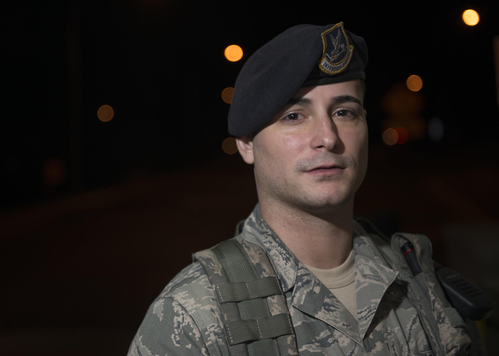 Staff Sgt. Keith Crouthamel, 512th Airlift Wing response force leader, performs guard duty during the night shift May 23, 2016, Dover Air Force Base, Del. Grant was mobilized to augment the 436th Security Force Squadron as they required additional manning during runway renovations. (U.S. Air Force Photo/Tech Sgt. Nathan Rivard)