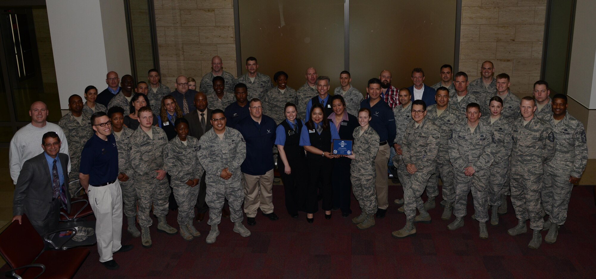 The 786th Force Support Squadron lodging team receives the First Sergeant’s Team Award May 25, 2016, at Ramstein Air Base. The 786th FSS accommodated military dependents from Incirlik Air Base, Turkey from the time they were removed from Incirlik until they returned to the United States or moved to temporary housing at Ramstein to finish the remainder of the school year. (U.S. Air Force photo/ Airman 1st Class Joshua Magbanua)