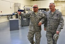 Commander of the 932nd Airlift Wing, Col. Jonathan Philebaum, discusses maintenance issues with the supervisor of the 932nd Metal Technology Shop, Master Sgt. Glenn Greene.  Colonel Philebaum took several days to make the rounds and meet people throughout the Illinois unit, which is part of 22nd Air Force, Air Force Reserve Command.  (U.S. Air Force photo by Tech. Sgt. Christopher Parr)