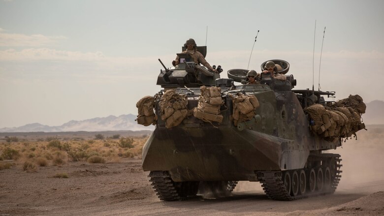 A Light Armored Vehicle with 2nd Light Armored Reconnaissance Battalion, 2nd Marine Division, traverses a road in the Black Top Training Area aboard Marine Corps Air Ground Combat Center Twentynine Palms, Calif., May 17, 2016. Various units from 2nd Marine Division participated in Integrated Training Exercise 3-16 in preparation for their deployment with Special Purpose Marine Air Ground Task Force-Crisis Response-Africa. 