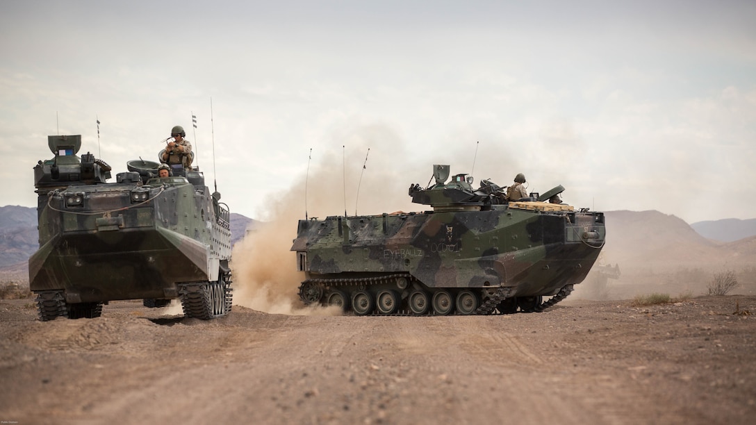 Light Armored Vehicles with 2nd Light Armored Reconnaissance Battalion, 2nd Marine Division, post security along a road in the Black Top Training Area aboard Marine Corps Air Ground Combat Center Twentynine Palms, Calif. May 17, 2016. Various units from 2nd Marine Division participated in Integrated Training Exercise 3-16 in preparation for their deployment with Special Purpose Marine Air Ground Task Force-Crisis Response-Africa. 