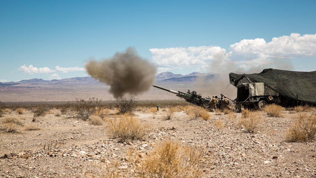 Marines with 3rd Battalion, 10th Marine Regiment, 2nd Marine Division, fire a 155mm M777A2 Light-weight Towed Howitzer in the Black Top Training Area aboard Marine Corps Air Ground Combat Center Twentynine Palms, Calif., May 18, 2016. Various units from 2nd Marine Division participated in Integrated Training Exercise 3-16 in preparation for their deployment with Special Purpose Marine Air Ground Task Force-Crisis Response-Africa. 