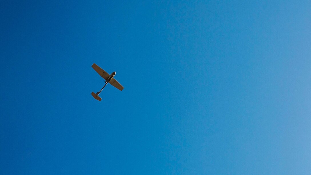 An unmanned aerial vehicle flies overhead during the UAV training portion of Khaan Quest 2016 at Five Hills Training Area near Ulaanbaatar, Mongolia, May 27. The training equipped MAF members with a deeper understanding of the purpose and operations of UAVs and how they can be used during peacekeeping missions. Khaan Quest 2016 is an annual, multinational peacekeeping operations exercise hosted by the Mongolian Armed Forces, co-sponsored by U.S. Pacific Command, and supported by U.S. Army Pacific and U.S. Marine Corps Forces, Pacific. Khaan Quest, in its 14th iteration, is the capstone exercise for this year’s Global Peace Operations Initiative program. The exercise focuses on training activities to enhance international interoperability, develop peacekeeping capabilities, build to mil-to-mil relationships, and enhance military readiness. Godsey is assigned to 8th military Police Brigade. 