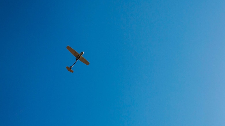 An unmanned aerial vehicle flies overhead during the UAV training portion of Khaan Quest 2016 at Five Hills Training Area near Ulaanbaatar, Mongolia, May 27. The training equipped MAF members with a deeper understanding of the purpose and operations of UAVs and how they can be used during peacekeeping missions. Khaan Quest 2016 is an annual, multinational peacekeeping operations exercise hosted by the Mongolian Armed Forces, co-sponsored by U.S. Pacific Command, and supported by U.S. Army Pacific and U.S. Marine Corps Forces, Pacific. Khaan Quest, in its 14th iteration, is the capstone exercise for this year’s Global Peace Operations Initiative program. The exercise focuses on training activities to enhance international interoperability, develop peacekeeping capabilities, build to mil-to-mil relationships, and enhance military readiness. Godsey is assigned to 8th military Police Brigade. 