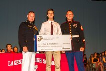 Kyle Herbstreit received the Naval Reserve Officer Training Corps Scholarship upon graduation from Lake Shore High School, May 26, 2016. Every year, the Marine Corps awards the NROTC Scholarship to mentally, morally and physically exceptional students attending four-year colleges or universities. The scholarship covers up to $180,000 for tuition, books, uniforms, lab fees and a monthly stipend up to $400.