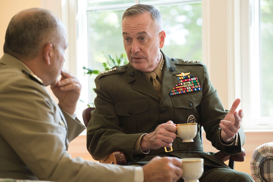 Marine Corps Gen. Joe Dunford, right, chairman of the Joint Chiefs of Staff, and Lt. Gen. Mahmoud Hegazy, chief of staff of Egypt's armed forces, talk over coffee at the chairman's residence at Joint Base Myer-Henderson Hall, Va., May 26, 2016. DoD photo by Army Staff Sgt. Sean K. Harp