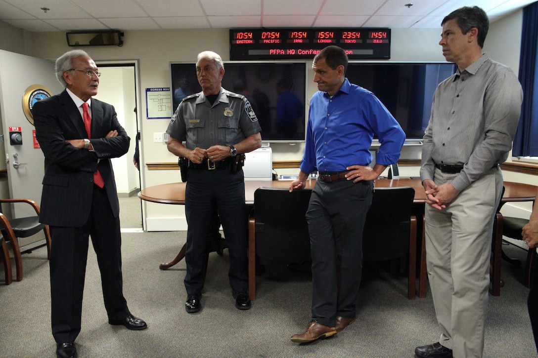Pentagon Force Protection Agency Director Steven E. Calvery, left, and Pentagon Chief of Police James Ballard, second from left, meet with Mayor Andy Berke of Chattanooga, Tenn., third from right, and the city’s police chief, Fred Fletcher during the Tennessee officials’ visit to the agency, Aug. 21, 2015. On July 16, 2015, five U.S. service members died and two others were injured in an attack on a military recruiting center and another U.S. military site in Chattanooga. DoD photo by Shannon Giles