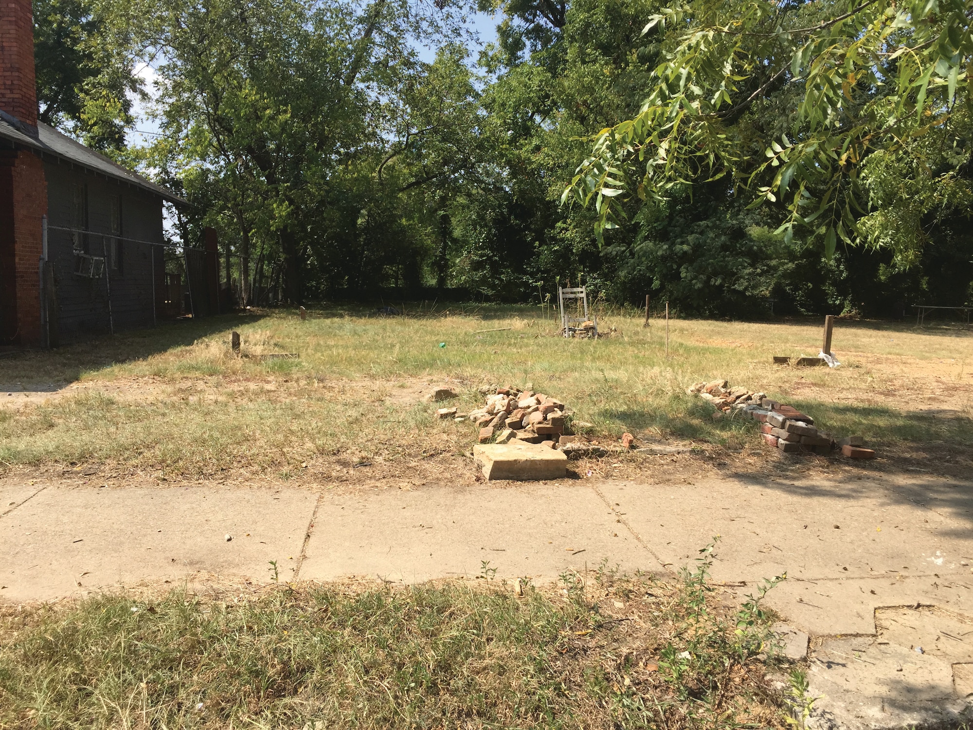 Staff Sgt. Montaski McCoy, Air Terminal Operations Center Specialist, 25th Aerial Port Squadron, 908th Airlift Wing, acquired three overgrown lots and began converting them into community gardens in 2013. The Mildred Street lot prior to conversion, Montgomery, Ala.