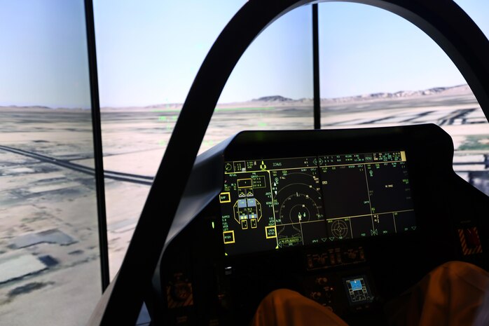 Lockheed Martin  displays the F-35 simulator during the 45th Annual Marine Corps Aviation Association Symposium and Marine Aviation Summit at New Bern, N.C., May 17, 2016. Hundreds of naval aviators gathered at the convention center for the opening brief to the weeklong event. Senior leaders gathered to discuss the future of Marine Corps aviation and the steps the Corps is taking to reach its set goals. (U.S. Marine Corps photo by Cpl. N.W. Huertas/Released)
