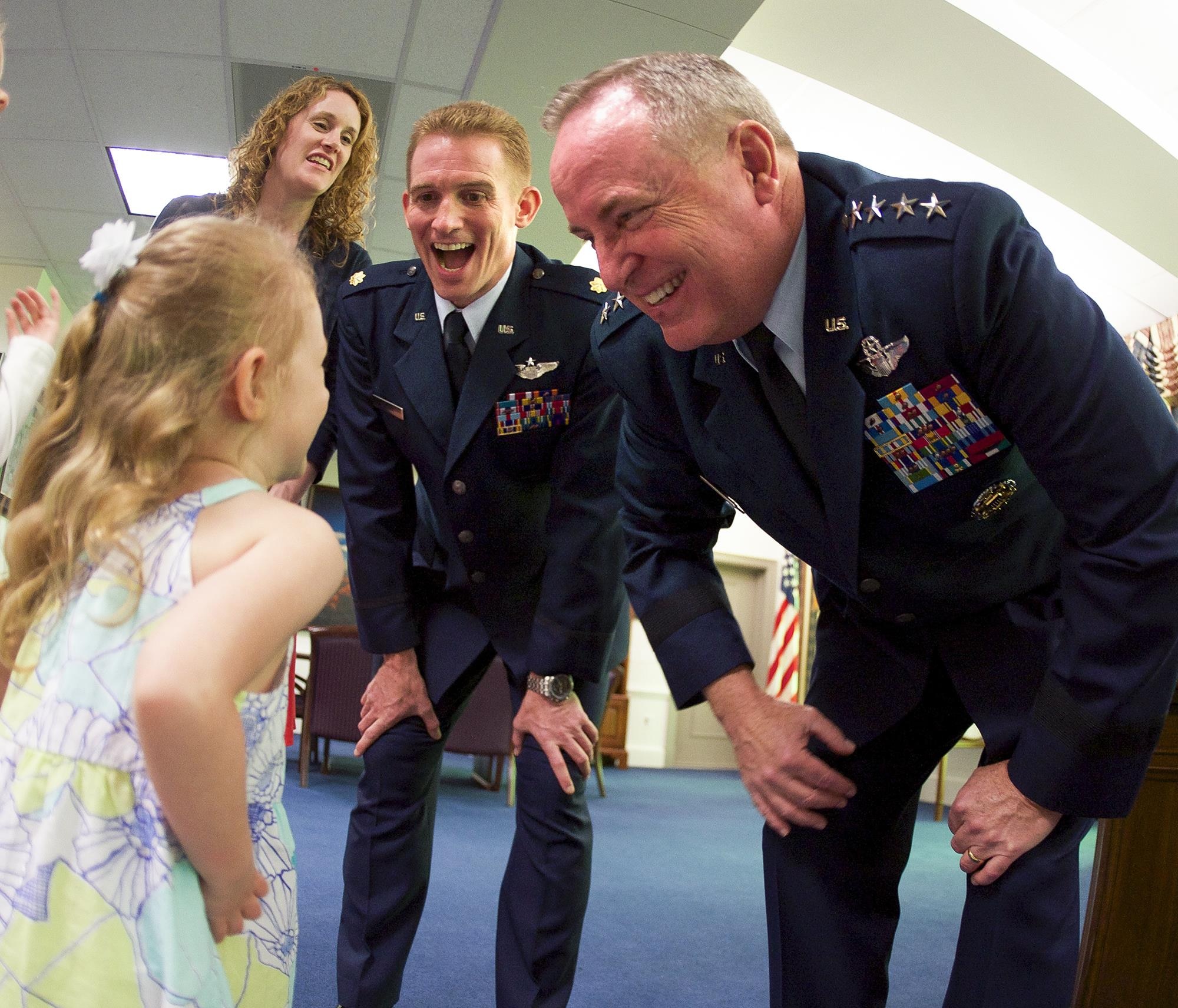 Air Force Chief of Staff Gen. Mark A. Welsh III hosts Maj. Jack Nelson and his family prior to Nelson receiving the 2015 Koren Kolligian Jr. Trophy at the Pentagon in Washington, D.C., May 25, 2016. Nelson, from the 9th Reconnaissance Wing at Osan Air Base, South Korea, received the award for his exceptional piloting skills and ingenuity at a moment of crisis during a mission. (U.S. Air Force photo/Andy Morataya)