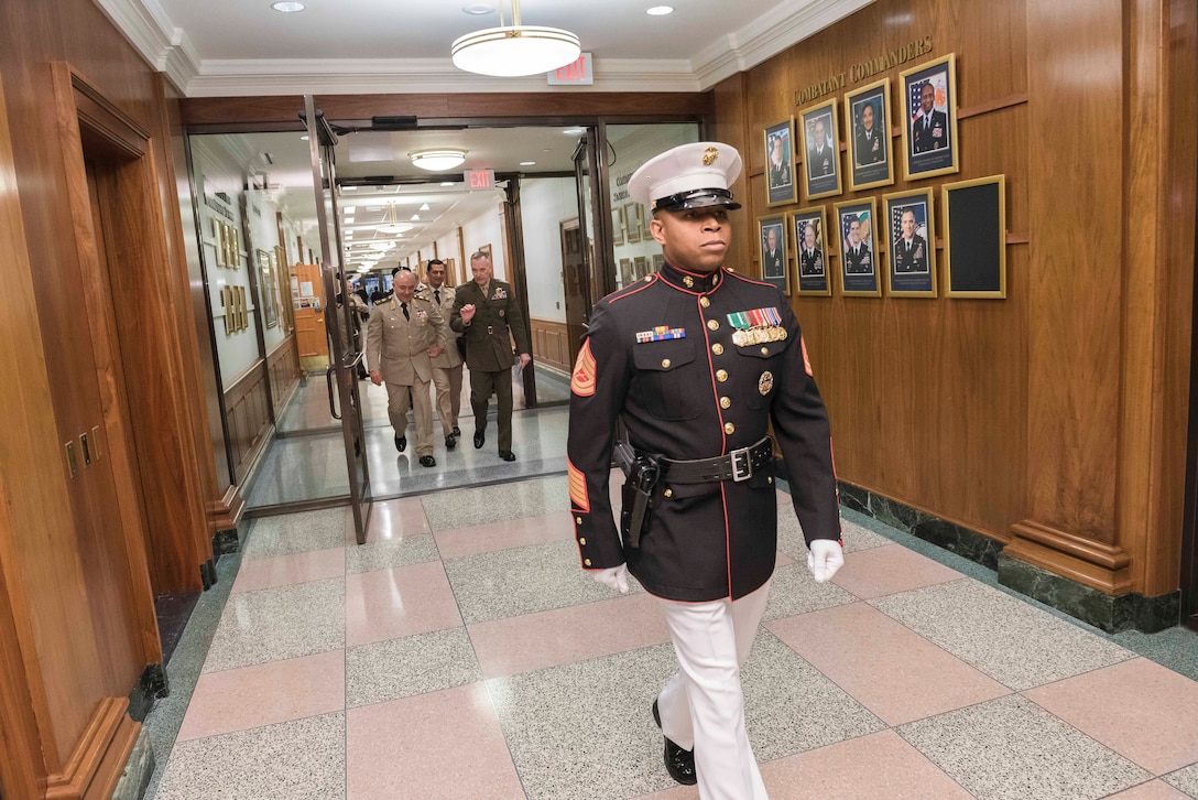 Marine Corps Gen. Joe Dunford, background right, chairman of the Joint Chiefs of Staff, and Lt. Gen. Mahmoud Hegazy, chief of staff of Egypt's armed forces, walk through the halls of the Pentagon, May 26, 2016. DoD photo by Army Staff Sgt. Sean K. Harp