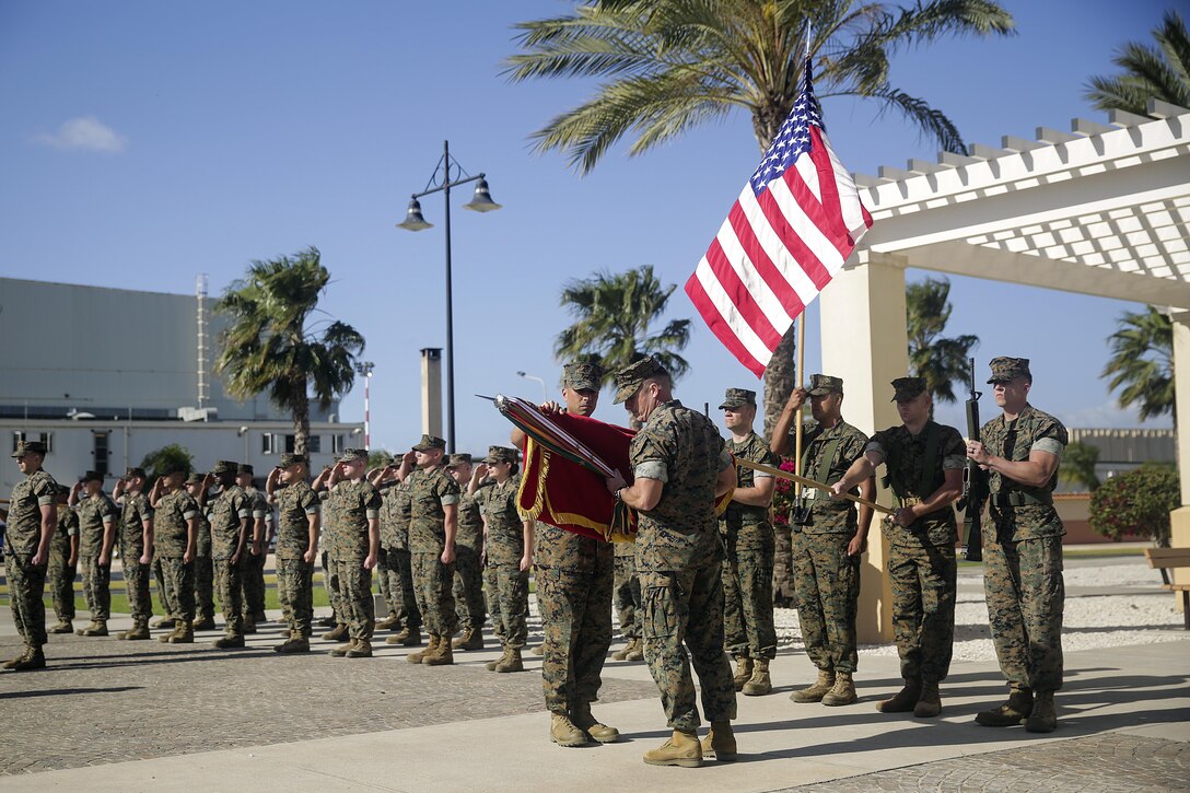 Lt. Col. Matthew Hakola, the Commanding Officer for Combat Logistics Battalion 6, and Sgt. Maj. Dean Orial, the Sergeant Major for CLB-6 prepare to encase the battalion’s colors for transfer of authority to CLB-2 at Naval Air Station Sigonella, Italy on April 25, 2016.  Special Purpose Marine Air-Ground Task Force Crisis Response-Africa Logistics Combat Element provides logistical support to the entire SPMAGTF enabling the protection of U.S. personnel, property and interests in Europe and Africa. (U.S. Marine Corps photo by Cpl. Alexander Mitchell/released)