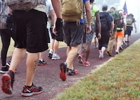 Airmen from across the 919th Special Operations Wing head out on a GoRuck Challenge event May 12, 2016 at Duke Field, Fla. The teambuilding exercise, based on special operations fitness training, put participants through a five-hour series of physically and mentally exhausting scenarios along an eight-mile ruck march.  (U.S. Air Force photo/Dan Neely)