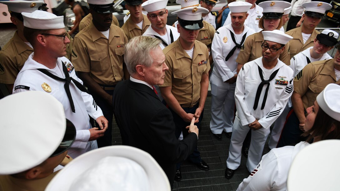 Secretary of the Navy Ray Mabus talks to a group of Marines and sailors during Fleet Week New York in Times Square, May 26, 2016. The Marines and sailors are visiting the city to interact with the public, demonstrate capabilities and teach the people of New York about America's sea services.