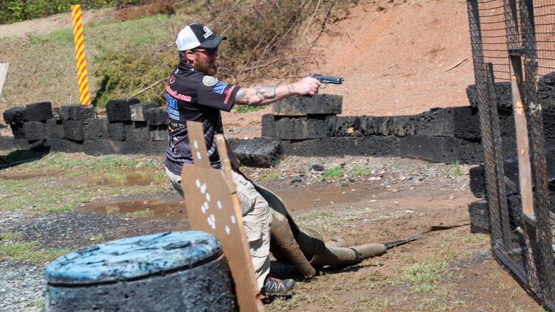 Sgt. James Gill (Ret.) runs the buddy drag portion of a shooting course at Marine Corps Base Quantico, Virginia, May 24, 2016. This course included a shotgun style skeet shoot, a recovery drag with pistol and a moving rifle engagement segment. Gill finished as one of the top competitors of the event despite having lost both a leg and an eye in service to the United States Marine Corps. 