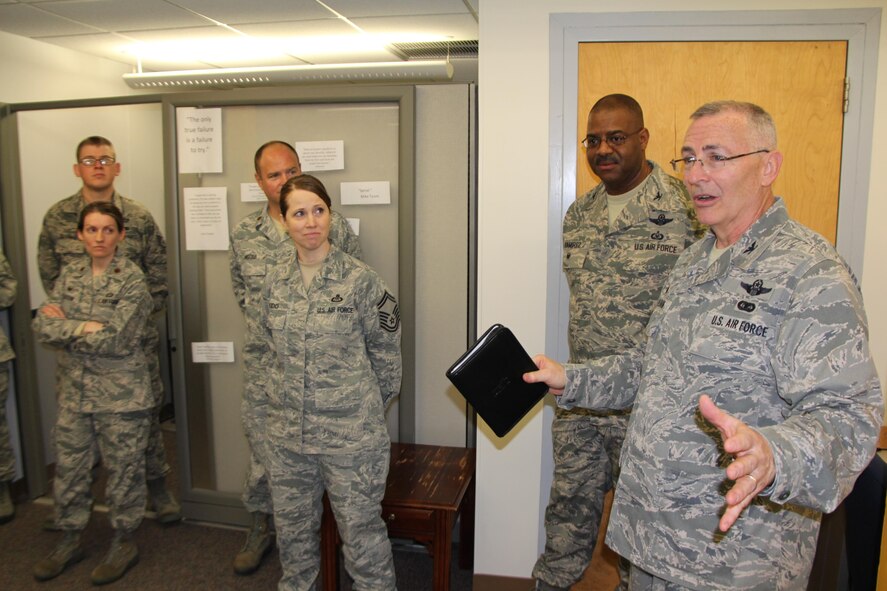 The 12th Operational Weather Flight meets the 932nd Airlift Wing commander, Col. Jonathan Philebaum (far right), at their work center on Scott Air Force Base, near Belleville, Illinois. Philebaum met with several Airmen, like these, during his immersion tour over several unit training assembly weekends, as a way to better understand their many various backgrounds and how they come together as a team at the 932nd Airlift Wing.  (U.S. Air Force photo by Maj. Stan Paregien)