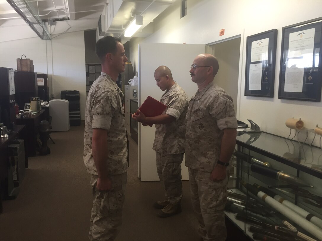 SSgt Beaton, a Marine of the Explosive Ordnance Disposal Advanced Training Center (EODATC), recently qualified as a Marine Corps Communication Electronics School Basic Instructor.  The Marine received certificates from the EODATC Director in recognition of his accomplishment.   