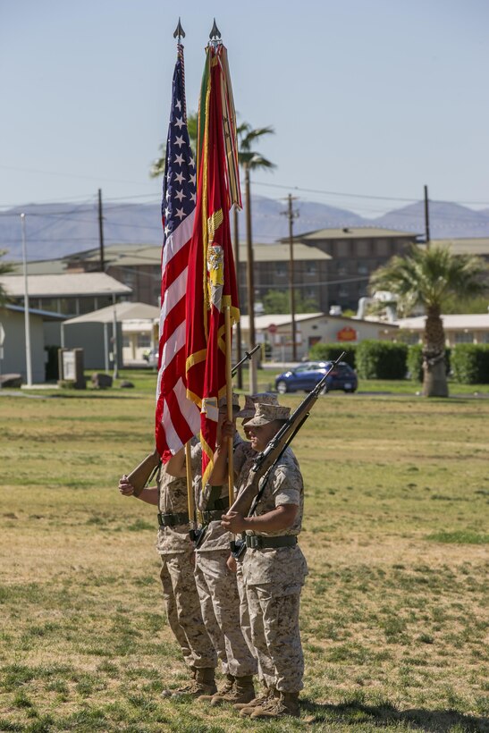 Marine Wing Support Squadron 374 color guard present the national and Marine Corps flags during a relief and appointment ceremony at Lance Cpl. Torrey L. Grey Field May 19, 2016. (Official Marine Corps photo by Lance Cpl. Dave Flores)