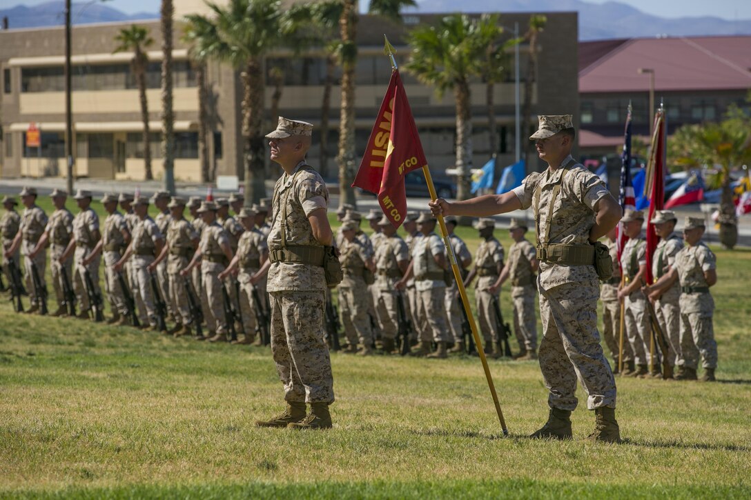 Marines with Marine Wing Support Squadron 374 stand at parade rest during a relief and appointment ceremony at Lance Cpl. Torrey L. Grey Field, May 19, 2016. (Official Marine Corps photo by Lance Cpl. Dave Flores)