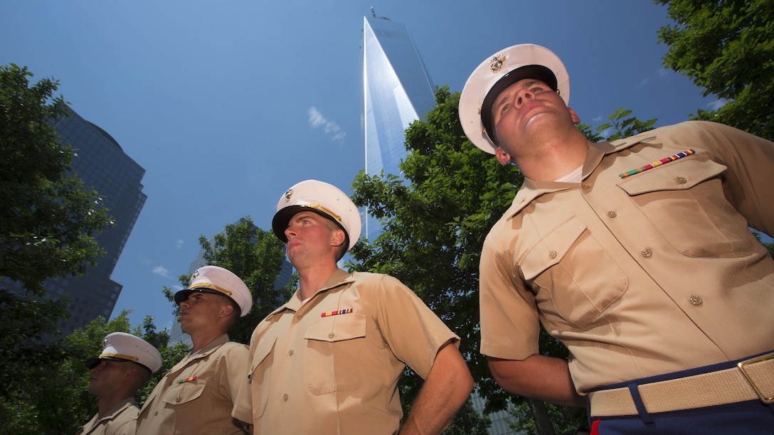 From right to left, 2nd Lt.’s Fletcher Baldwin, Benjamin Zeiss, Matthew George and Robert Demson, all infantry officers with 3rd Battalion, 6th Marine Regiment, stand in formation awaiting promotion to first lieutenant during a joint promotion and re-enlistment ceremony at the 9/11 Memorial in New York City during Fleet Week, May 27, 2016.U.S. Marines and sailors are in New York to interact with the public, demonstrate capabilities and teach the people of New York about America's sea services.