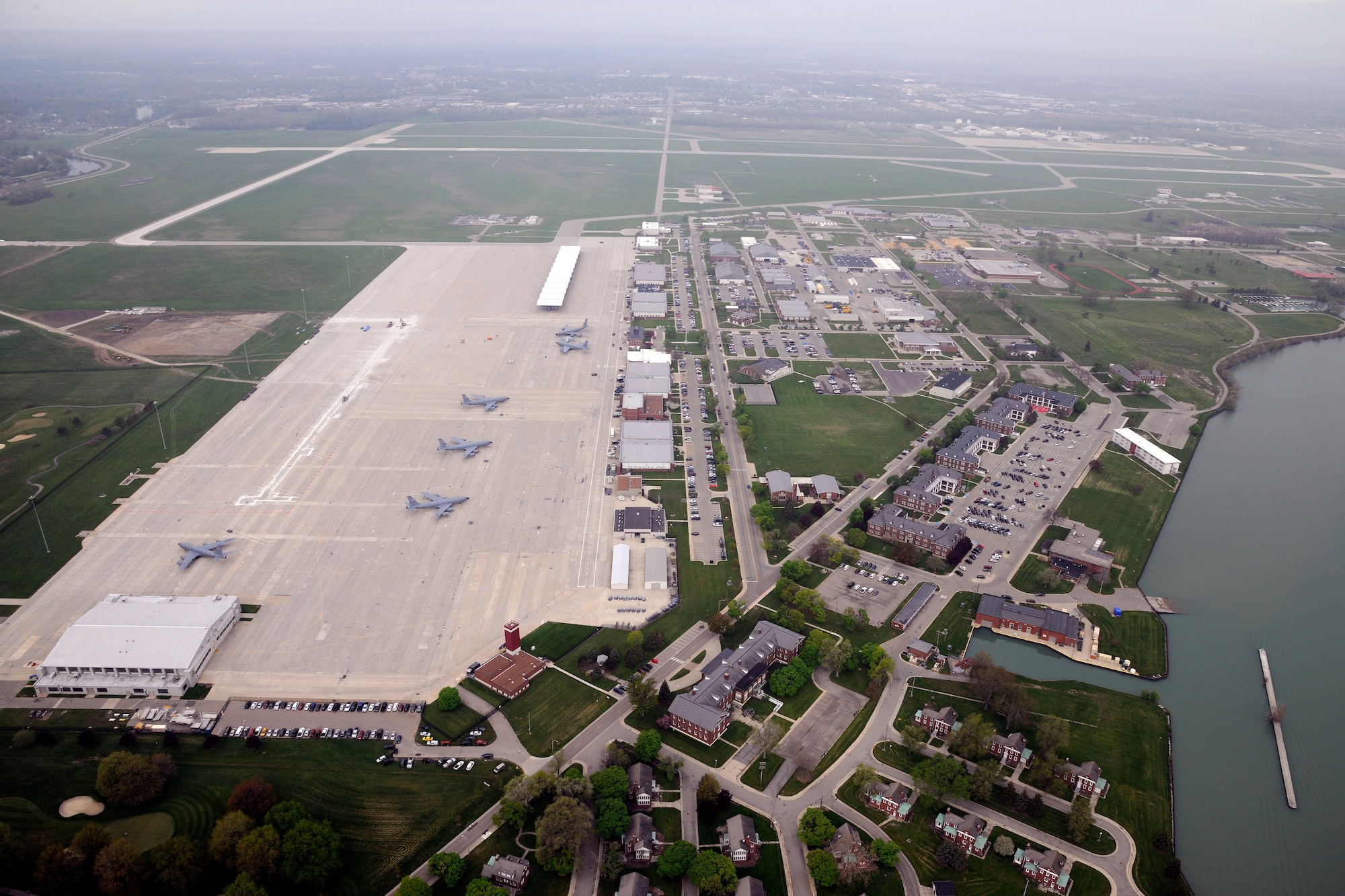Selfridge Air National Guard Base is seen from the south in this May 12, 2016, photo, taken from an HH-65 Dolphin helicopter operated by U.S. Coast Guard Air Station Detroit, one of some 40 tenants that have operations at Selfridge. Personnel assigned to the base near Detroit are ramping up for the 100th anniversary of the establishment of Selfridge Field in July 1917. Selfridge is one of the oldest continuously operating military air fields in the nation. The 127th Wing is a component of the Michigan Air National Guard and has been the host unit at Selfridge since 1971. (U.S. Air National Guard photo by Senior Airman Ryan Zeski)
