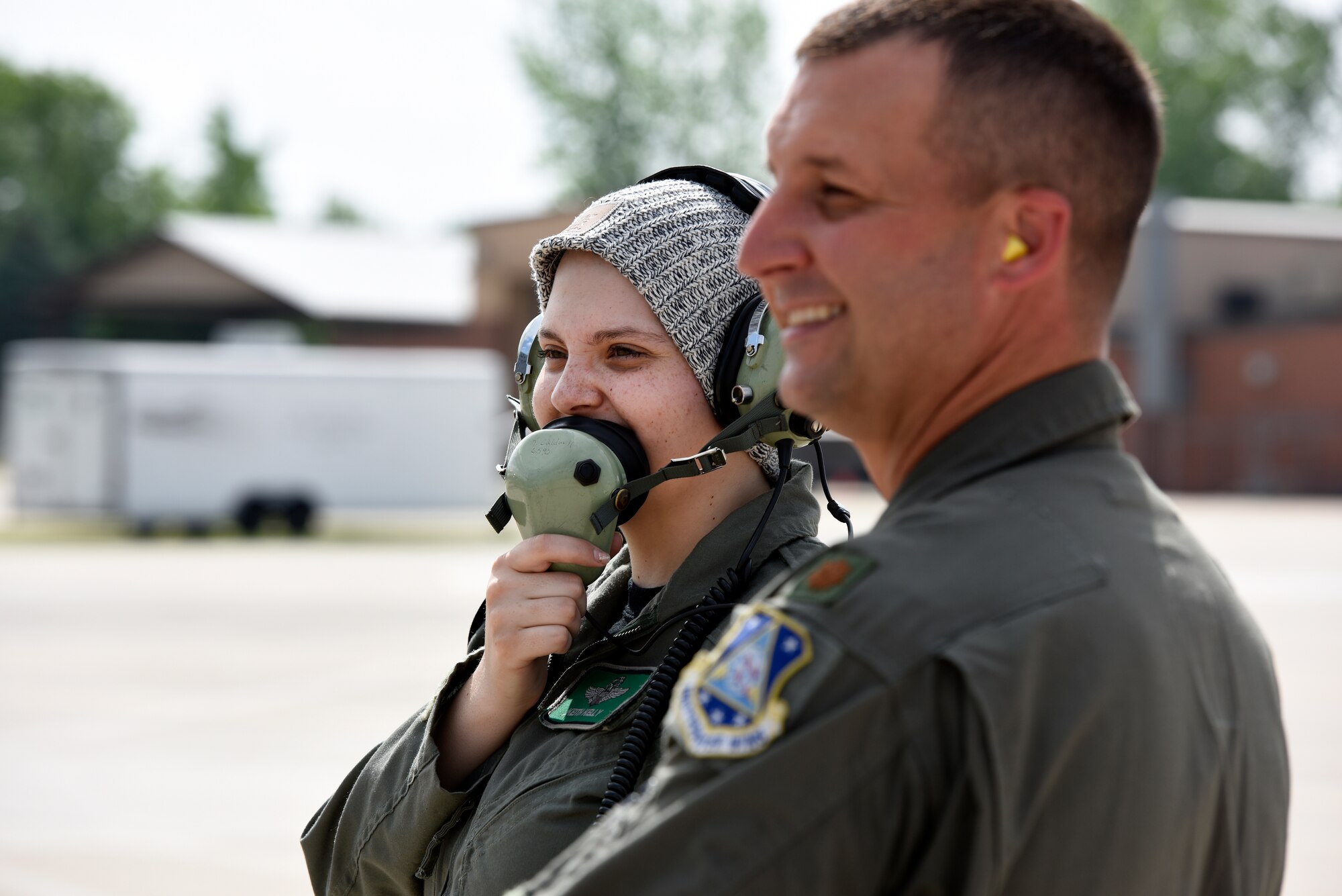 Honorary 2nd Lt. Ashleigh Hunt launches an f-16 Fighting Falcon as U.S. Air Force Maj. Brian Cherolis, an F-16 pilot assigned to the 180th Fighter Wing, supervises on the flight line May 26, 2016 during Pilot for a Day, a program supporting children and young adults who live with chronic or life-threatening illnesses. The Pilot for a Day program allows the 180FW to give back to the local community, whose enduring support for the Airmen makes the 180FW mission possible. (U.S. Air National Guard photo by Staff Sgt. Shane Hughes)